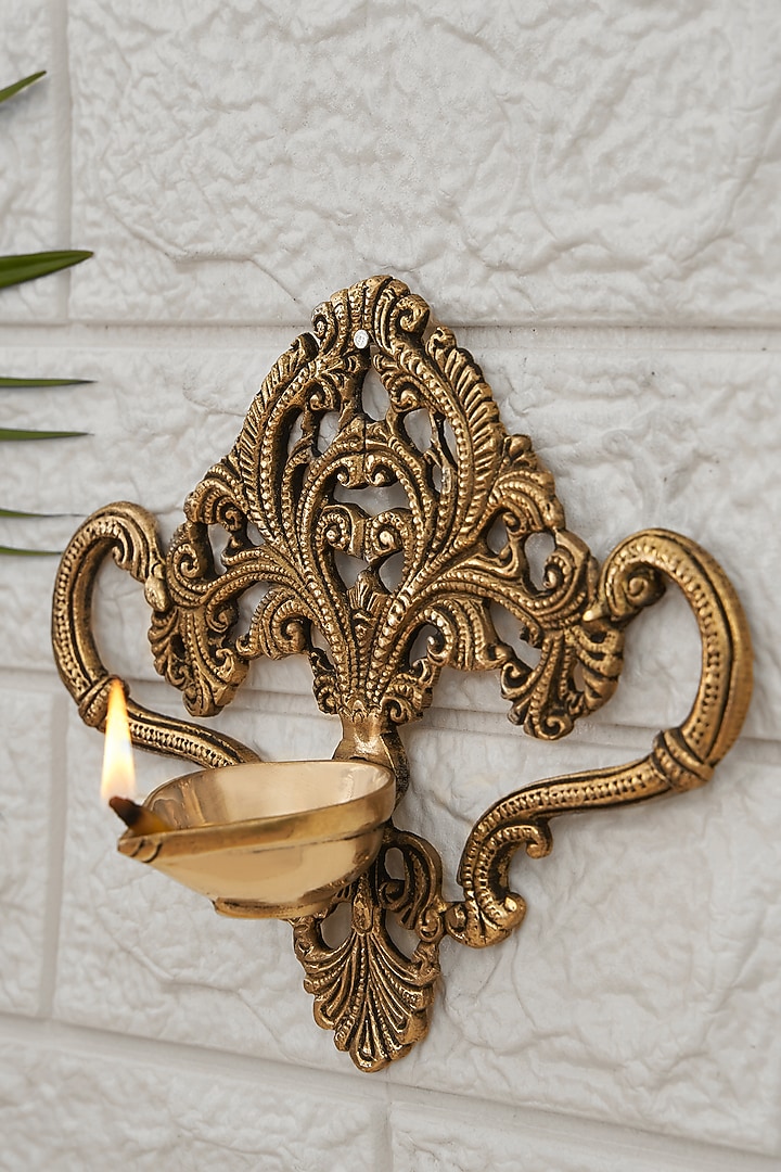 Golden Brass Wall Diya by DecorTwist at Pernia's Pop Up Shop