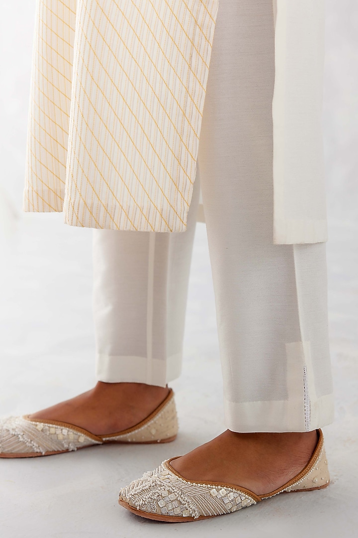 Ivory Cotton Silk Blend Embroidered Kurta Set by Devnaagri at Pernia's Pop Up Shop