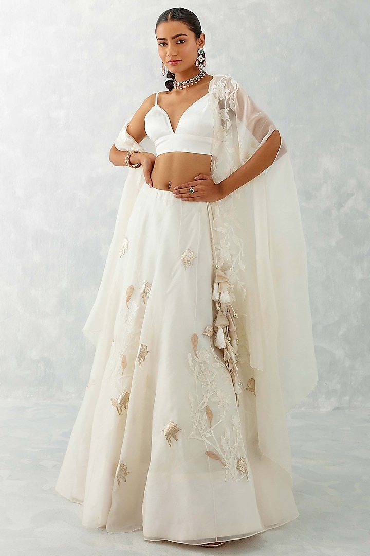 Ivory Silk Organza Embroidered Jacket Wedding Lehenga Set by Devnaagri at Pernia's Pop Up Shop