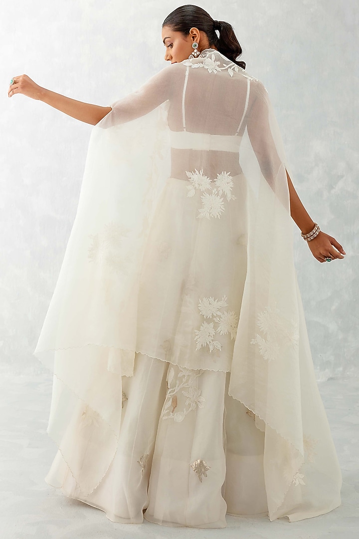 Ivory Silk Organza Embroidered Jacket Wedding Lehenga Set by Devnaagri at Pernia's Pop Up Shop