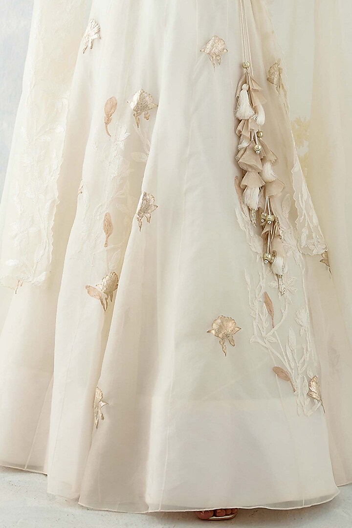 Ivory Silk Organza Embroidered Jacket Wedding Lehenga Set by Devnaagri at Pernia's Pop Up Shop