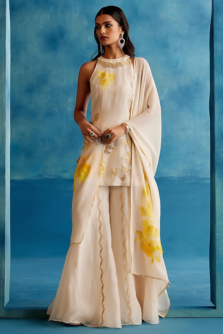 Ivory Silk Organza Embroidered Sharara Set by Devnaagri at Pernia's Pop Up Shop