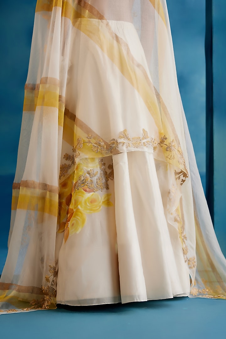 Ivory & Yellow Silk Chanderi Zari Embroidered & Floral Hand-Painted Wedding Lehenga Set by Devnaagri at Pernia's Pop Up Shop