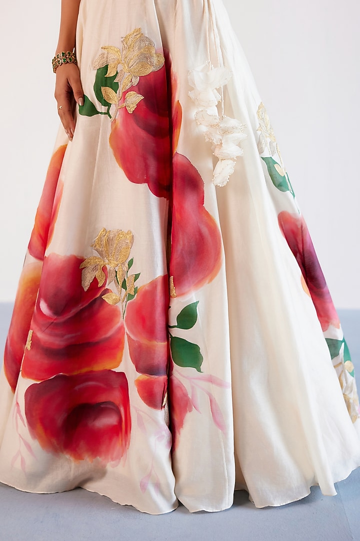 Beige & Red Silk Chanderi Floral Hand-Painted Wedding Lehenga Set by Devnaagri at Pernia's Pop Up Shop