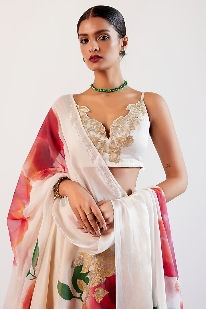 Beige & Red Silk Chanderi Floral Hand-Painted Wedding Lehenga Set by Devnaagri at Pernia's Pop Up Shop