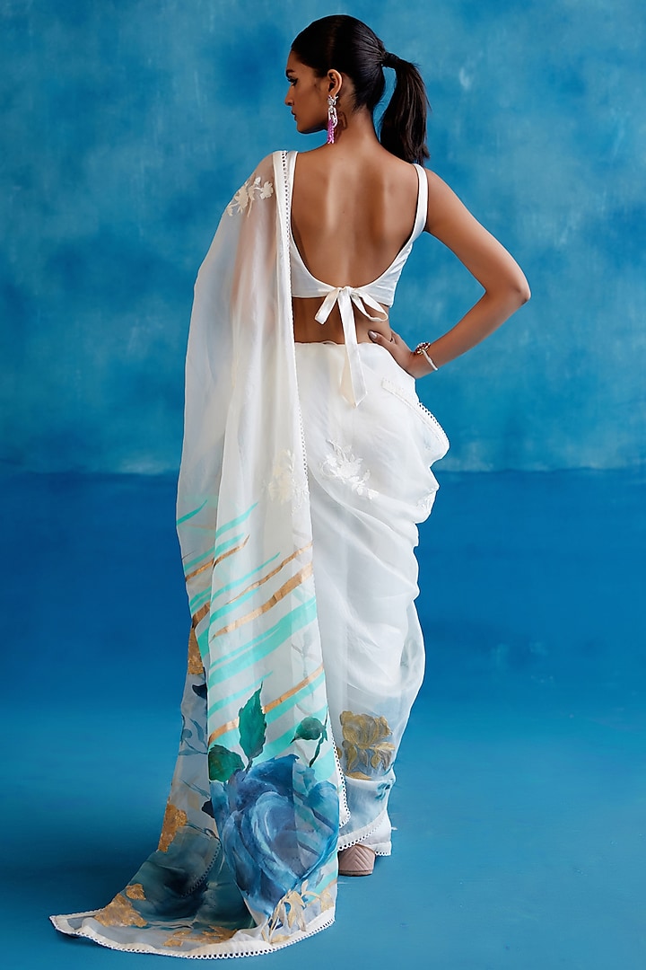 Ivory & Blue Silk Organza Floral Hand-Painted Wedding Saree Set by Devnaagri at Pernia's Pop Up Shop