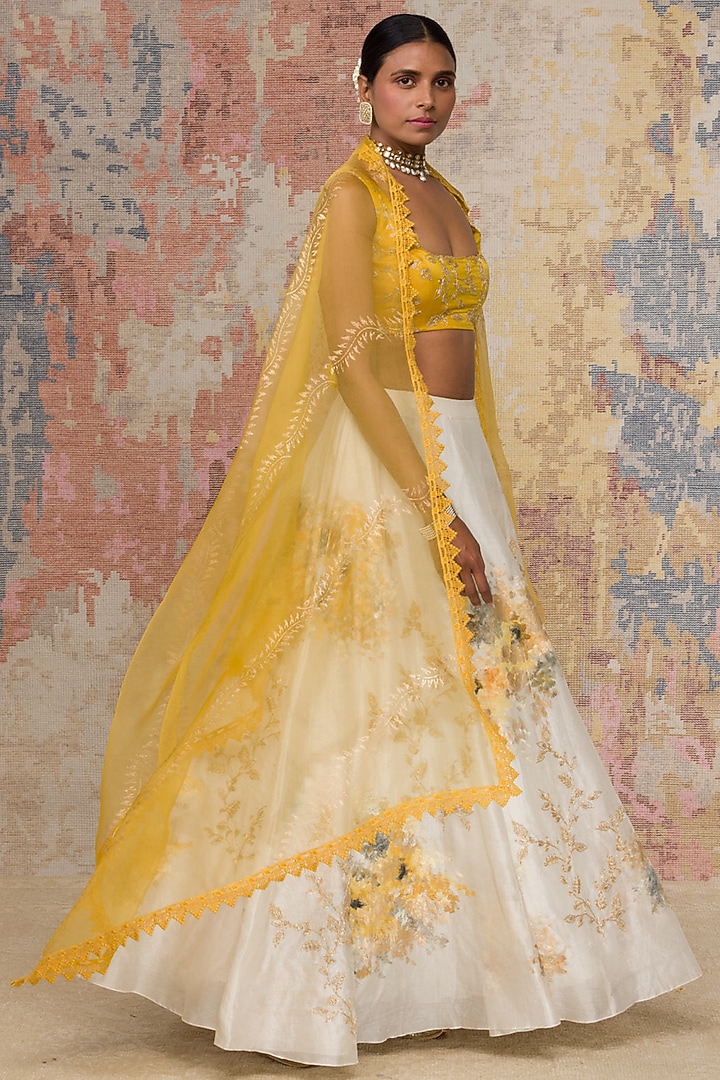 Ivory Embroidered Wedding Lehenga Set by Devnaagri at Pernia's Pop Up Shop
