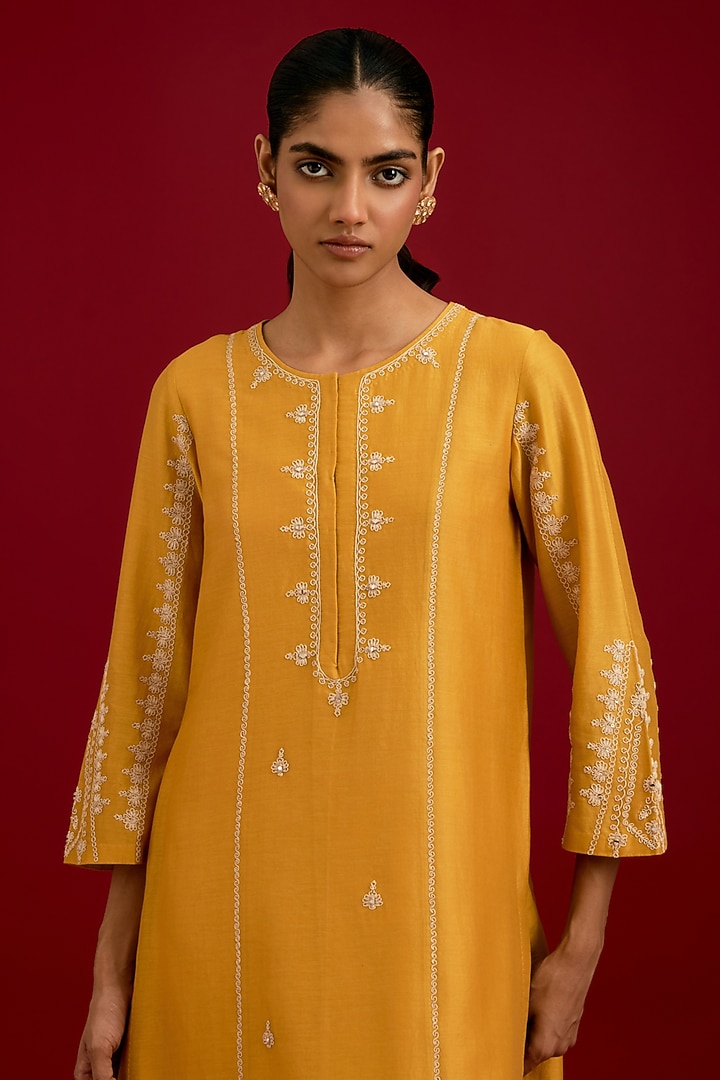 Mustard Silk Chanderi Mirror Embroidered Kurta Set by Devnaagri at Pernia's Pop Up Shop