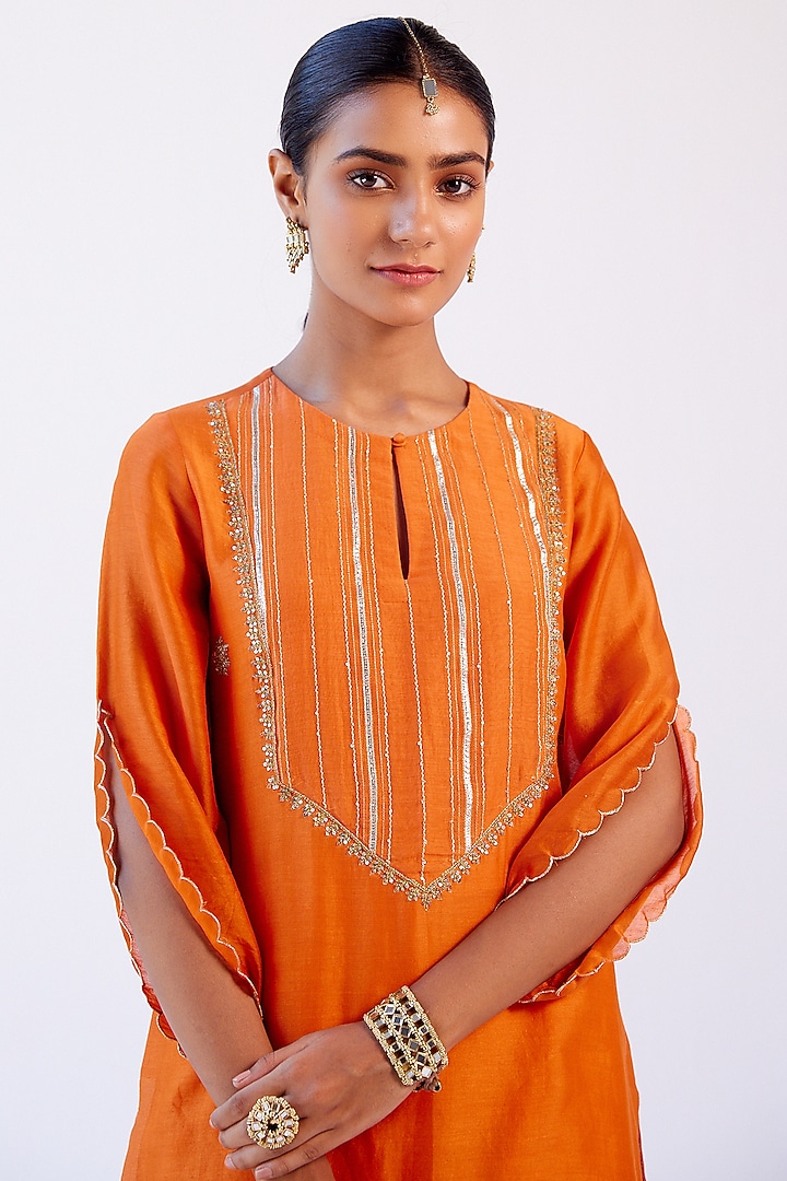 Orange Sequins Embroidered Kurta Set by Devnaagri at Pernia's Pop Up Shop