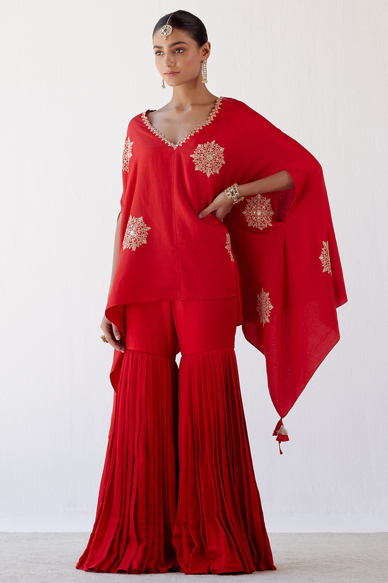 Red store sequin cape