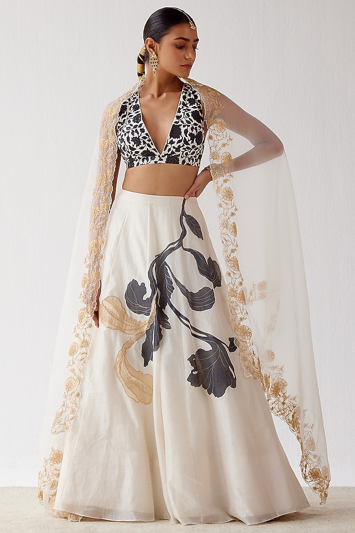 Ivory Hand-Painted & Embroidered Wedding Lehenga Set by Devnaagri at Pernia's Pop Up Shop