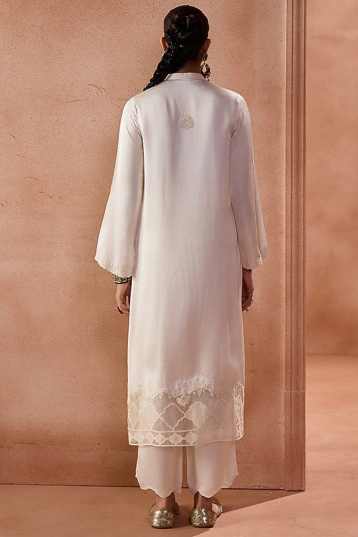 Ivory Raw Silk Satin Dori Embroidered Kurta Set by Devnaagri at Pernia's Pop Up Shop