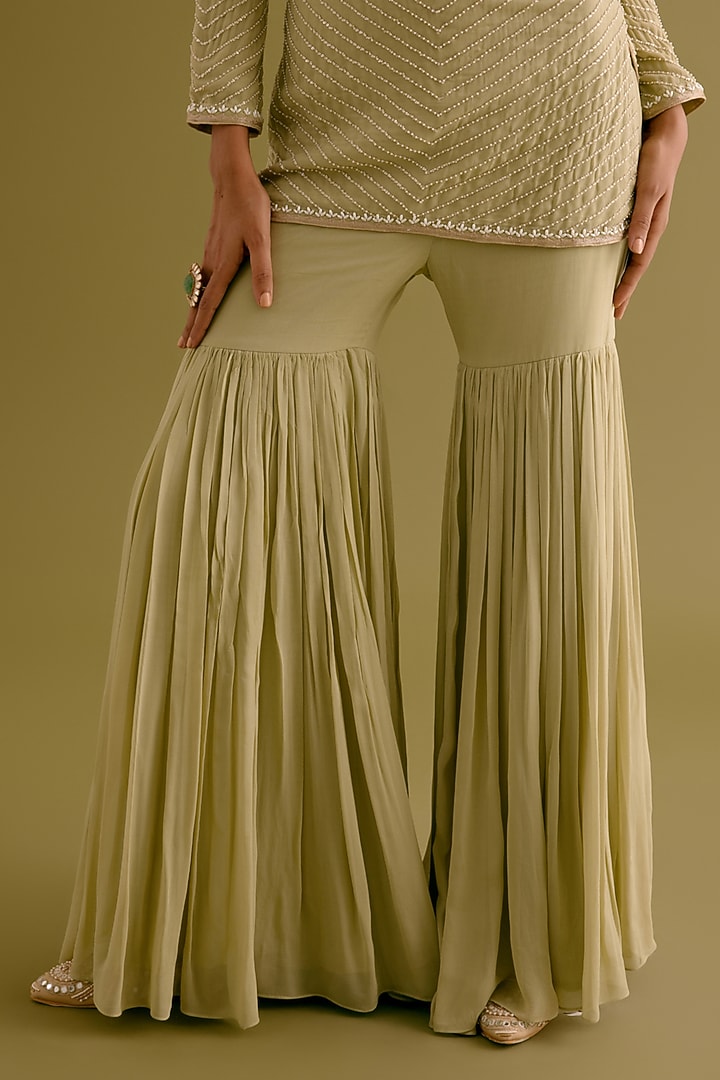 Olive Green Georgette Gharara Set by Devnaagri at Pernia's Pop Up Shop