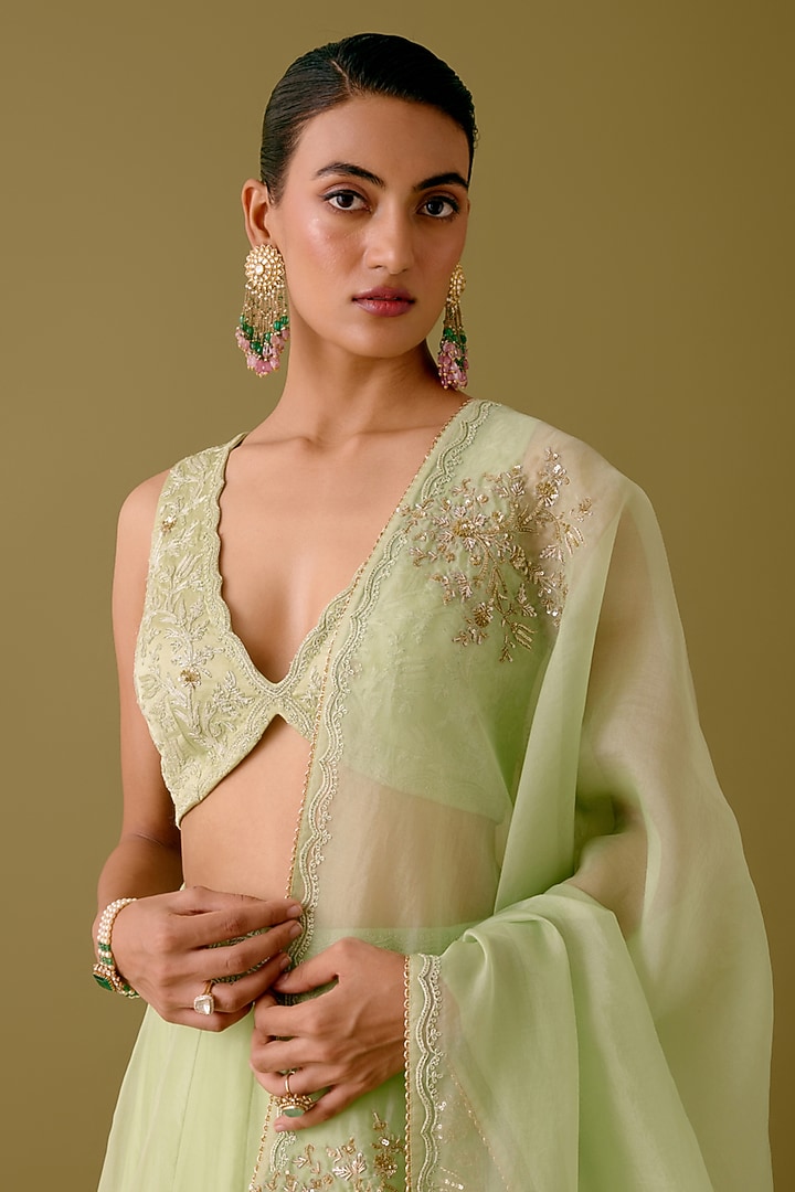 Pistachio Green Silk Organza Sequins Embroidered Bridal Lehenga Set by Devnaagri at Pernia's Pop Up Shop