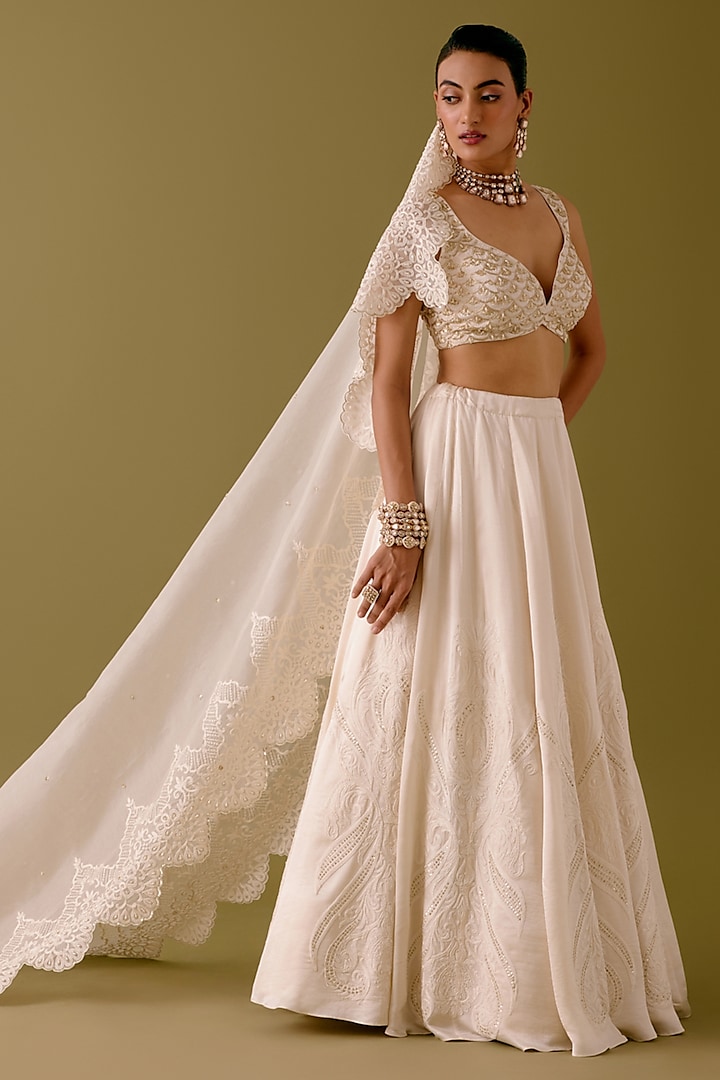 Ivory Silk Satin Dori Embroidered Bridal Lehenga Set by Devnaagri at Pernia's Pop Up Shop