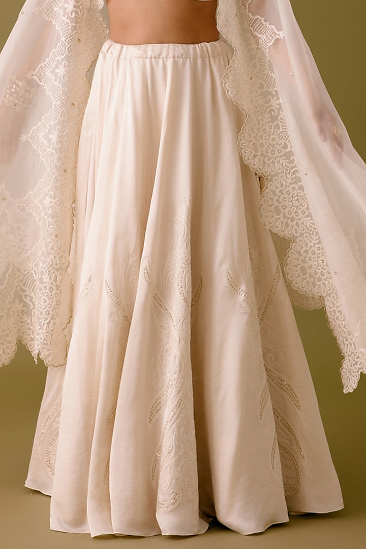 Ivory Silk Satin Dori Embroidered Bridal Lehenga Set by Devnaagri at Pernia's Pop Up Shop