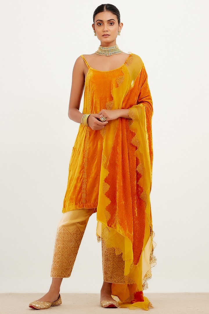 Saffron Velvet Embroidered Kurta Set by Devnaagri at Pernia's Pop Up Shop