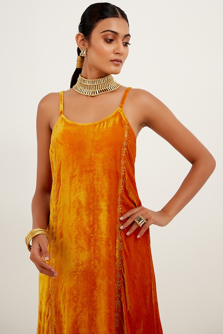 Saffron Velvet Embroidered Kurta Set by Devnaagri at Pernia's Pop Up Shop
