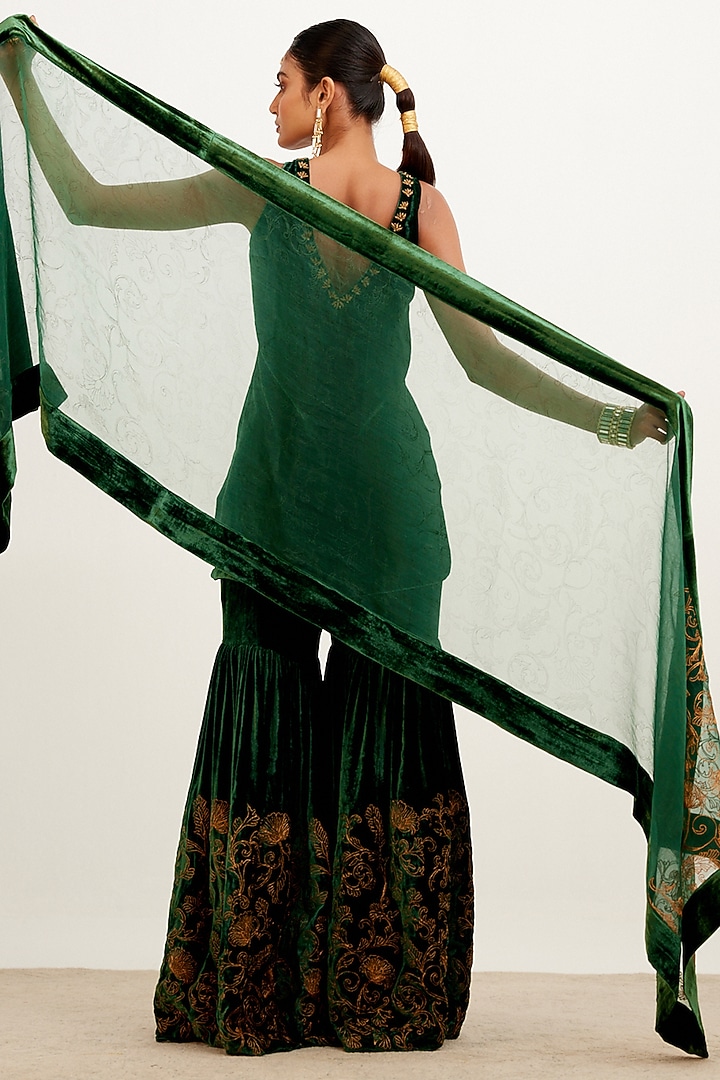 Bottle Green Velvet Wedding Sharara Set by Devnaagri at Pernia's Pop Up Shop