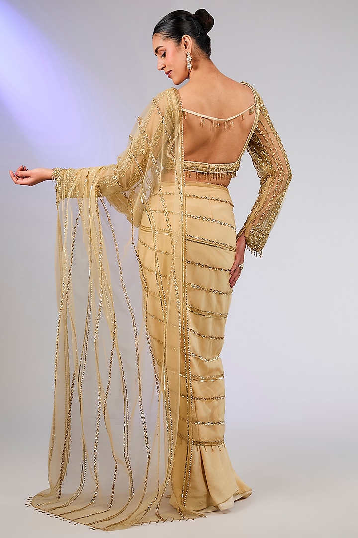 Champagne Gold Tulle & Crepe Geometric Embroidered Draped Skirt Reception Saree Set by DiyaRajvvir at Pernia's Pop Up Shop