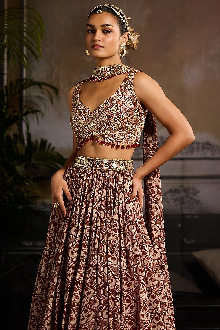 Maroon Organza & Crepe Leaf Printed Wedding Lehenga Set by DiyaRajvvir at Pernia's Pop Up Shop