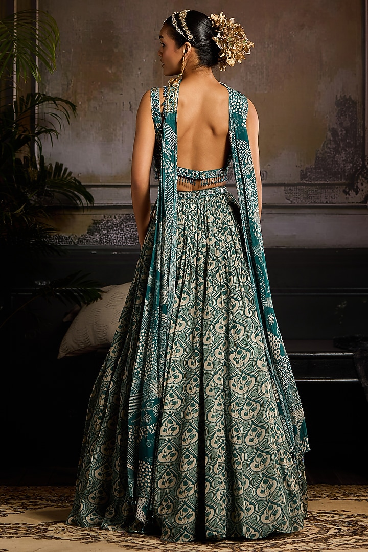 Teal Organza & Crepe Leaf Printed Wedding Lehenga Set by DiyaRajvvir at Pernia's Pop Up Shop