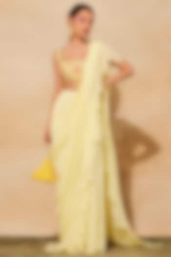 Pastel Yellow GeorgetteRuffled Pant Saree Set by DiyaRajvvir