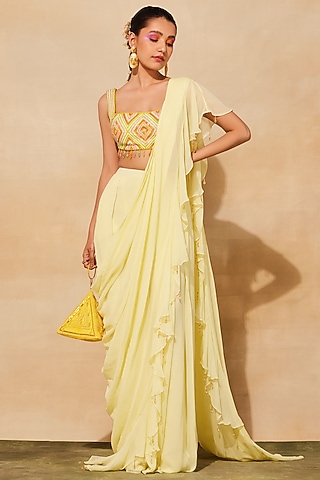 Pastel Yellow Georgette Box Pleated Ruffled Pant Saree Set by DiyaRajvvir