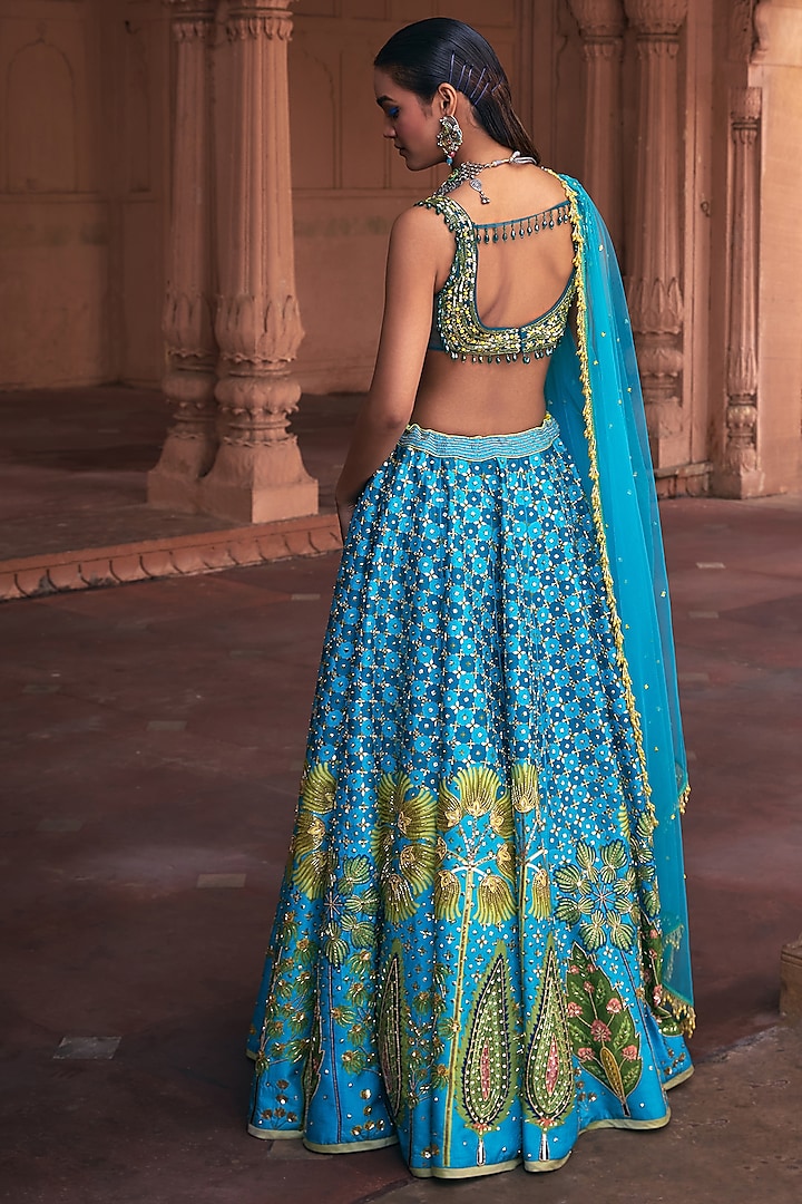 Turquoise Raw Silk & Tulle Floral Printed Wedding Lehenga Set by DiyaRajvvir at Pernia's Pop Up Shop