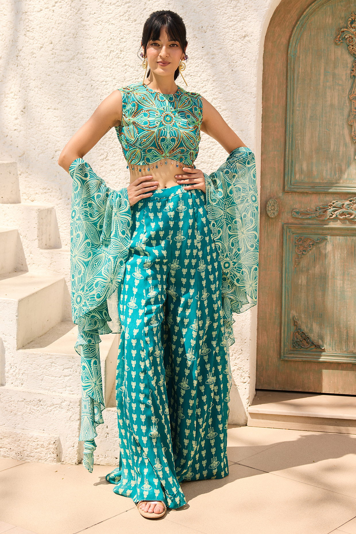 Teal Georgette Printed Flared Pant Set by DiyaRajvvir at Pernia's Pop Up Shop