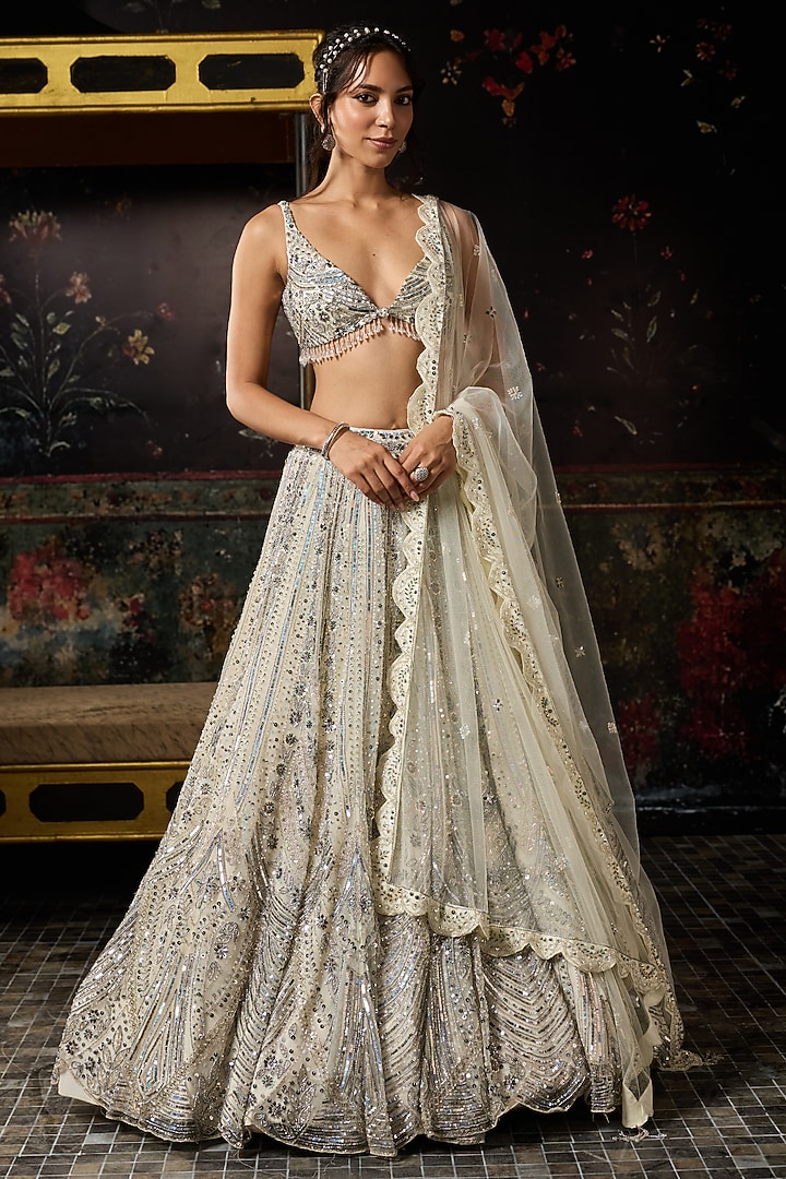 Ivory Tulle Embellished Bridal Lehenga Set by DiyaRajvvir at Pernia's Pop Up Shop