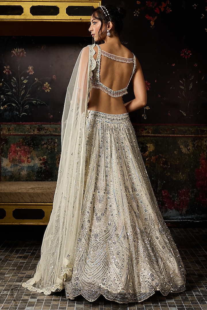Ivory Tulle Embellished Bridal Lehenga Set by DiyaRajvvir at Pernia's Pop Up Shop