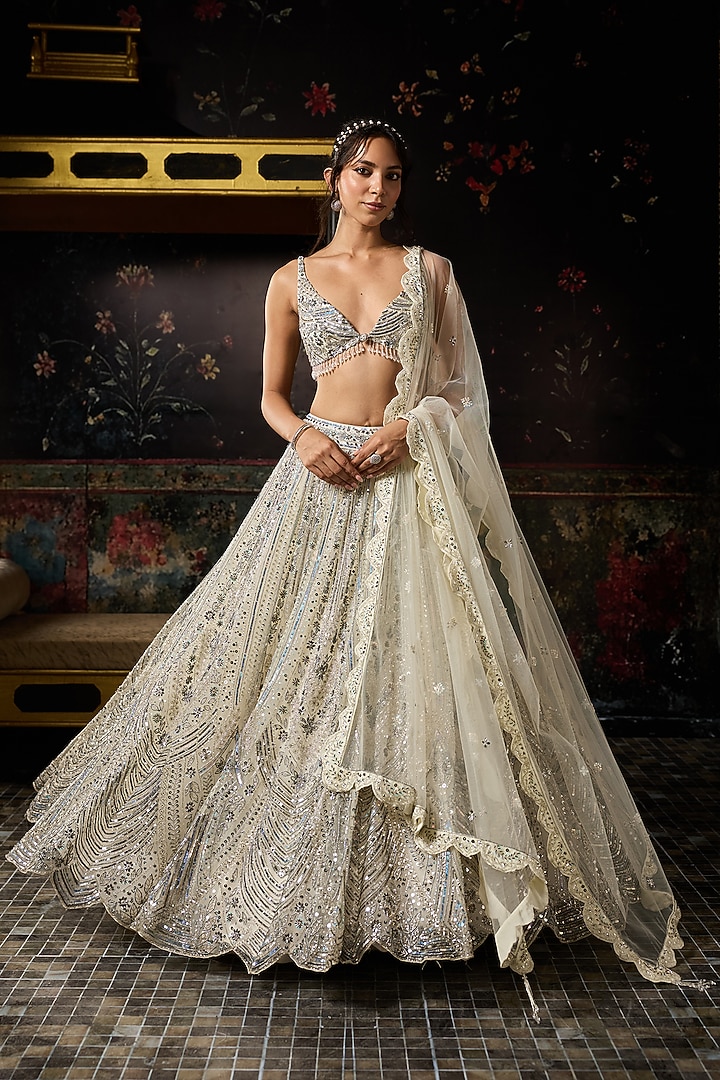 Ivory Tulle Embellished Bridal Lehenga Set by DiyaRajvvir at Pernia's Pop Up Shop