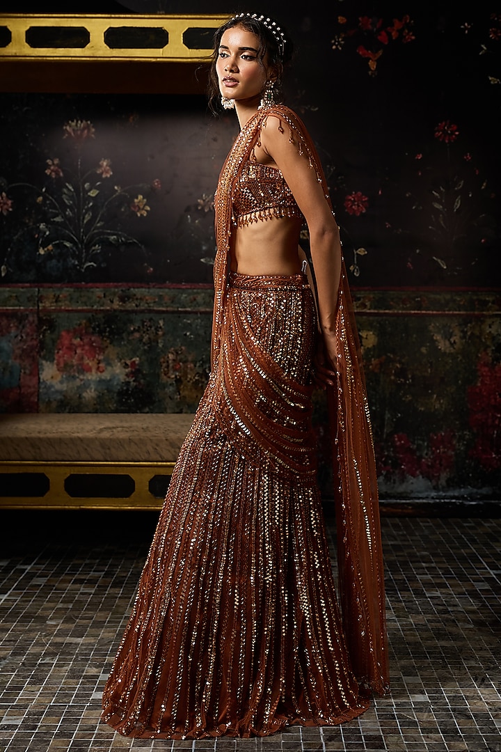 Metallic Rust Tulle Embellished Pre-Draped Skirt Reception Saree Set by DiyaRajvvir at Pernia's Pop Up Shop