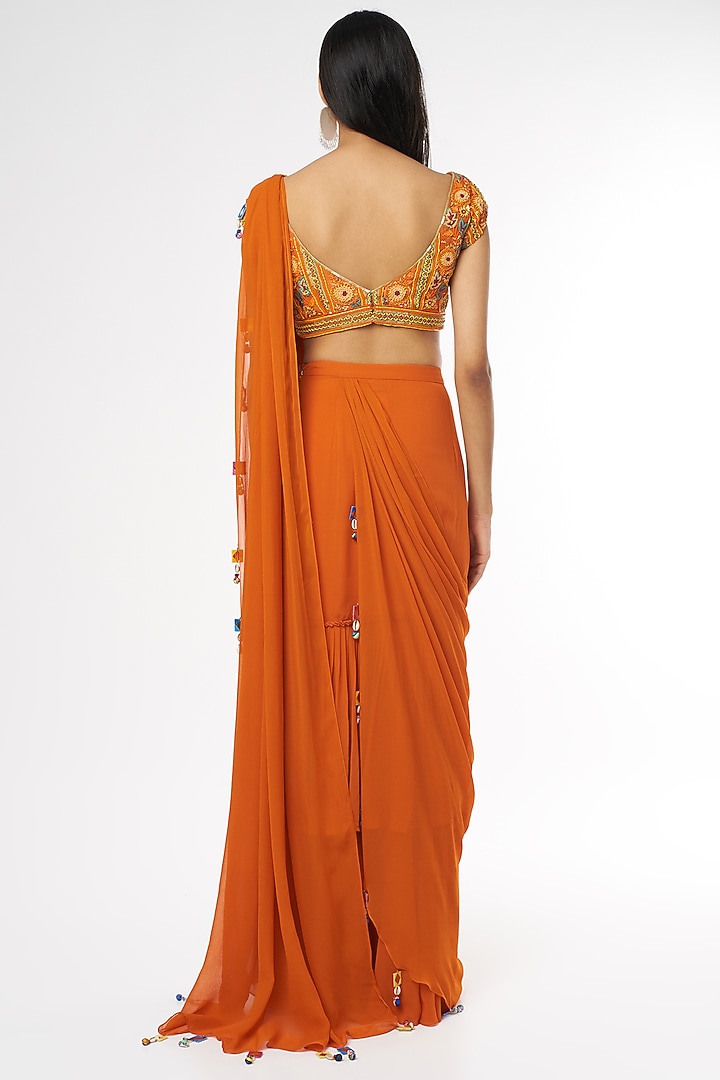 Rust Georgette Skirt Wedding Saree Set With Potli Bag by DiyaRajvvir at Pernia's Pop Up Shop