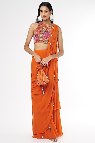 Rust Georgette Tasseled Skirt Saree Set With Potli Bag by DiyaRajvvir