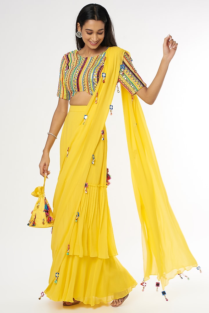 Yellow Tasseled Skirt Saree Set With Potli Bag by DiyaRajvvir