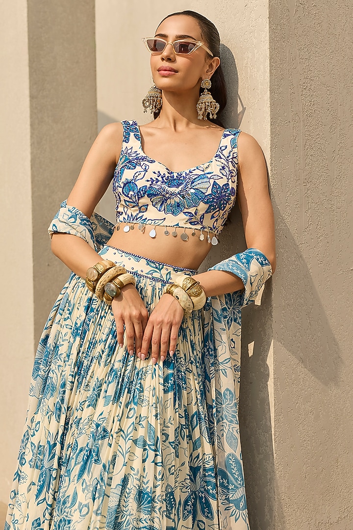 Ivory & Blue Crepe Floral Printed Wedding Lehenga Set by DiyaRajvvir at Pernia's Pop Up Shop