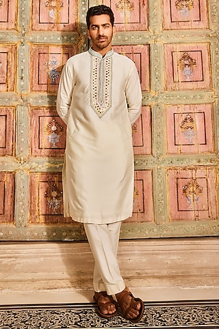 Pastel Yellow Cotton Silk Thread Embroidered Kurta by DiyaRajvvir Men