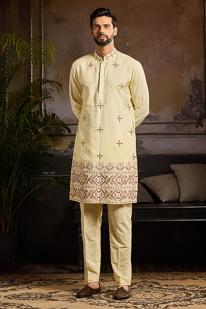 Pastel Yellow Cotton Silk Thread Embroidered Kurta Set by DiyaRajvvir Men