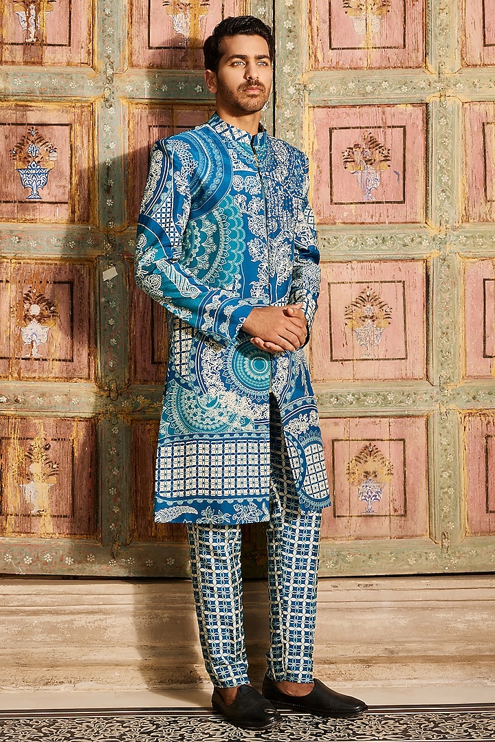 Teal Blue Dola Silk Thikri Printed Indowestern Jacket Set by DiyaRajvvir Men