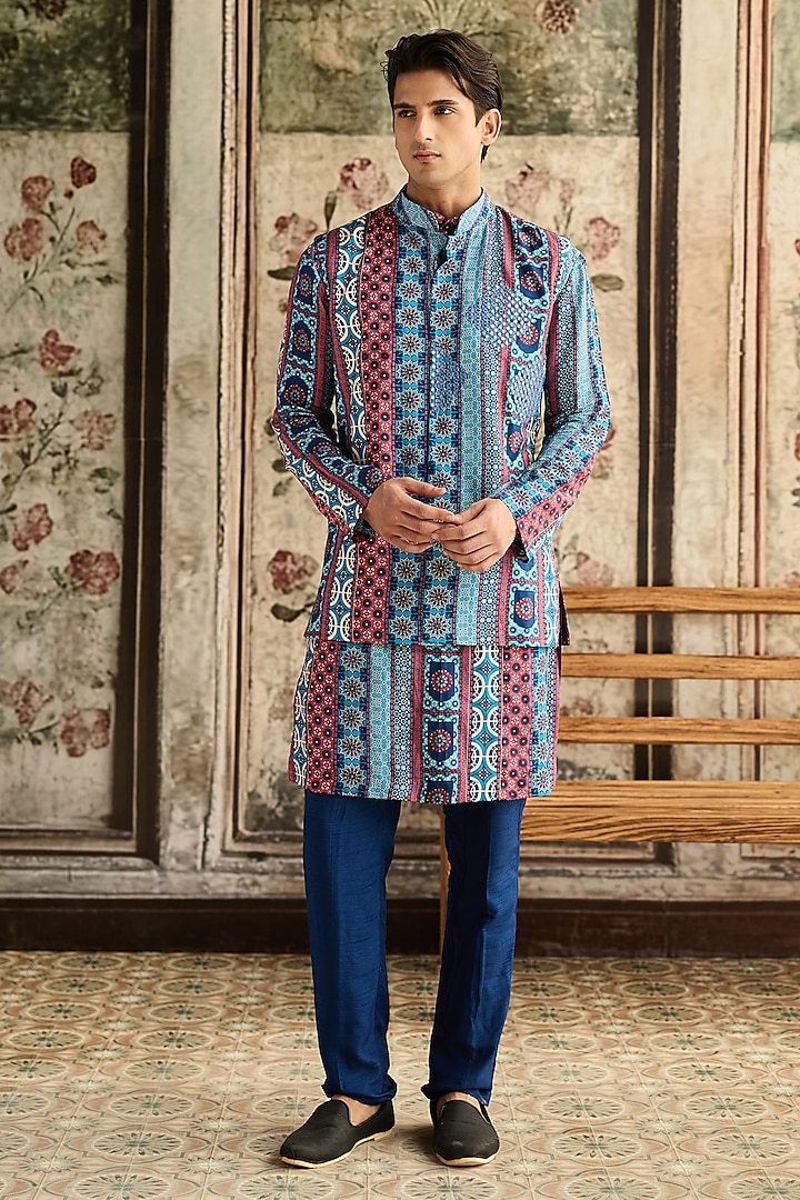 Blue Dola Silk Printed & Mirror Embroidered Bundi Jacket Set by DiyaRajvvir Men at Pernia's Pop Up Shop