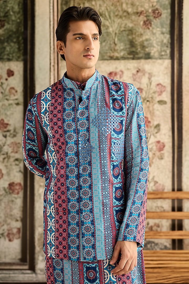 Blue Dola Silk Printed & Mirror Embroidered Bundi Jacket Set by DiyaRajvvir Men at Pernia's Pop Up Shop