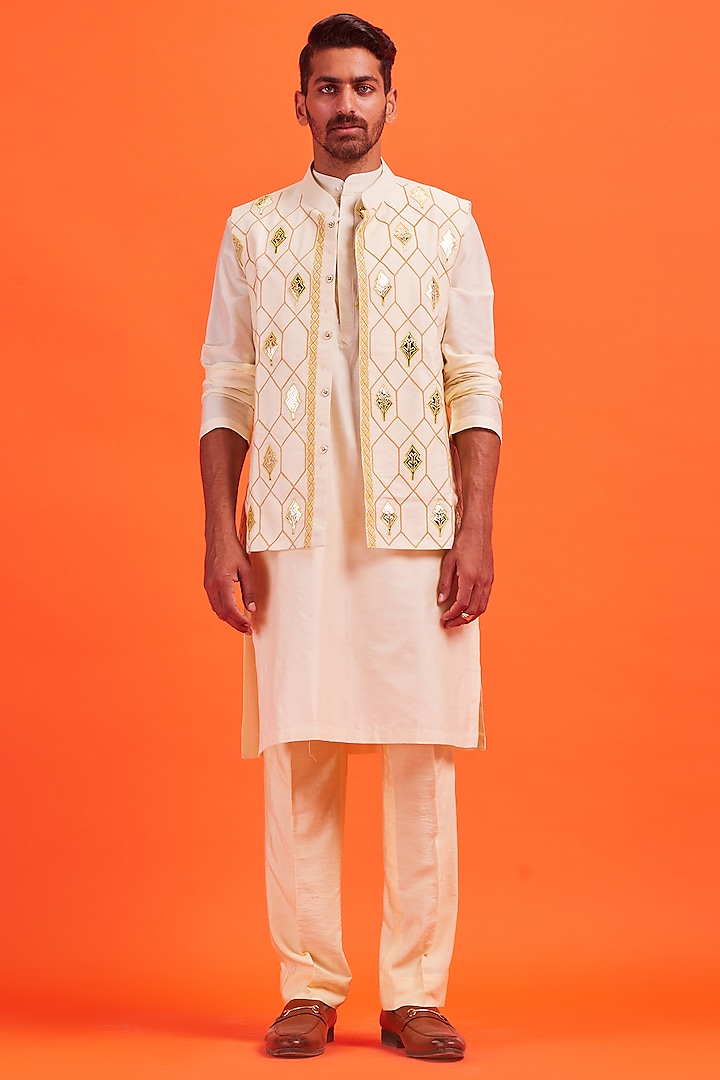 Pastel Yellow Silk Embroidered Bundi Jacket With Kurta Set by DiyaRajvvir Men
