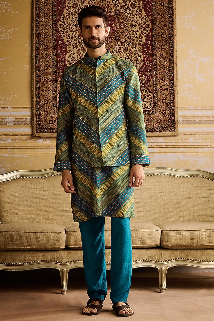 Teal Dola Silk Chevron Printed & Mirror Embellished Bundi Jacket Set by DiyaRajvvir Men at Pernia's Pop Up Shop