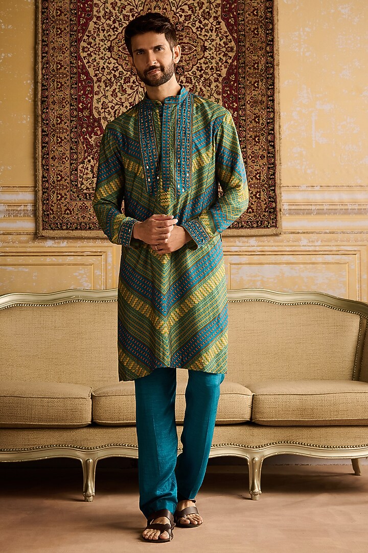 Teal Dola Silk Chevron Printed & Mirror Embellished Bundi Jacket Set by DiyaRajvvir Men at Pernia's Pop Up Shop