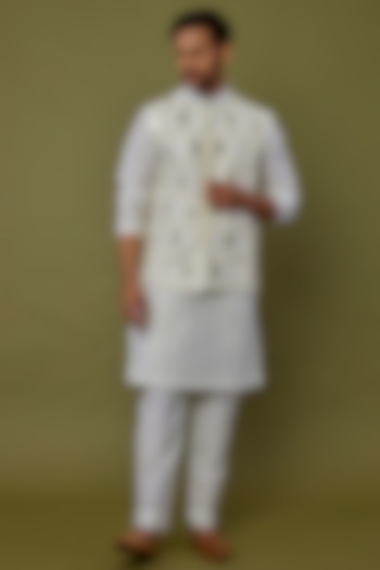 White Embroidered Kurta Set With Bundi Jacket by DiyaRajvvir Men