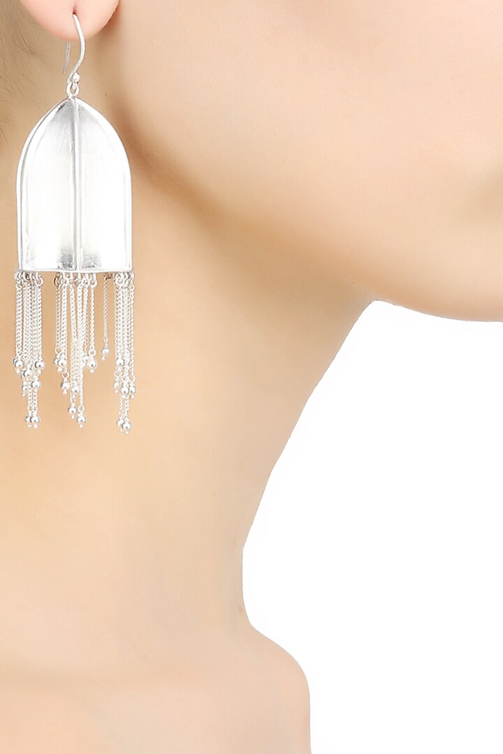 Dvibhumi presents Silver finish "Anila" textured dome fringe drop danglers available only at Pernia's Pop Up Shop.