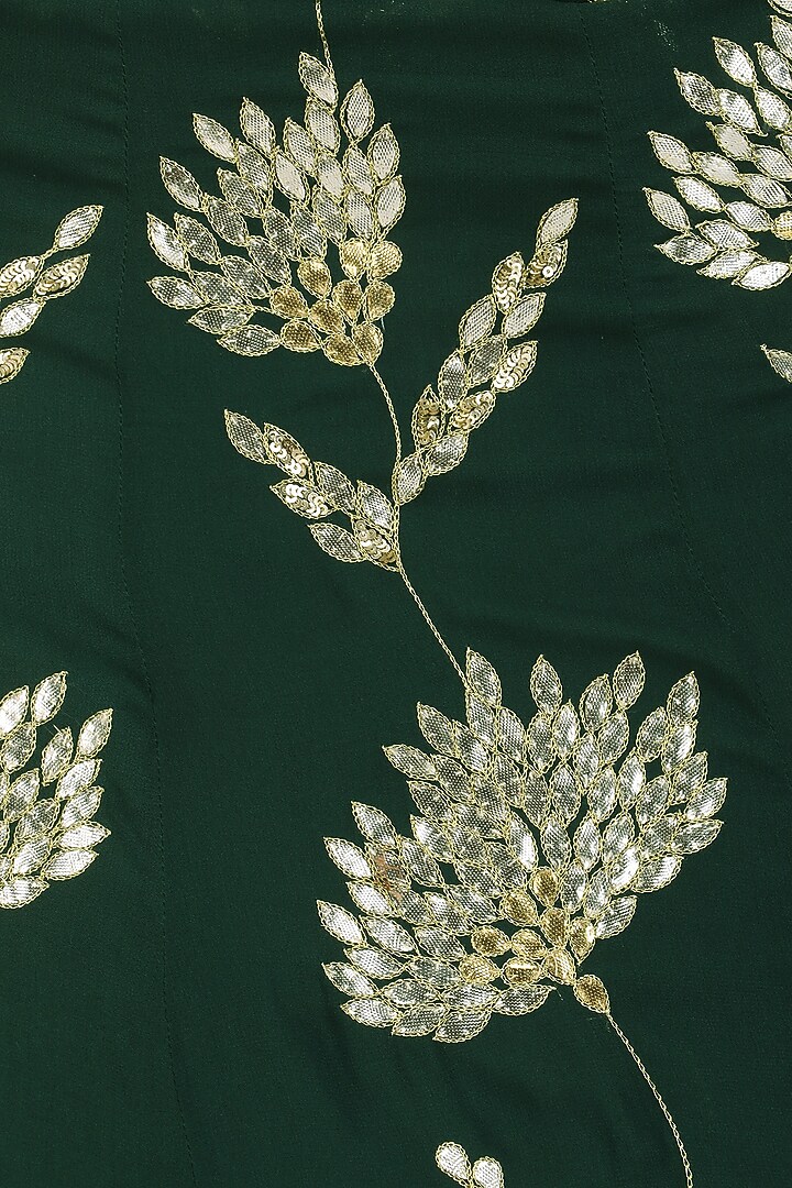 Emerald green and gold embroidered lehenga set available only at Pernia's Pop Up Shop.