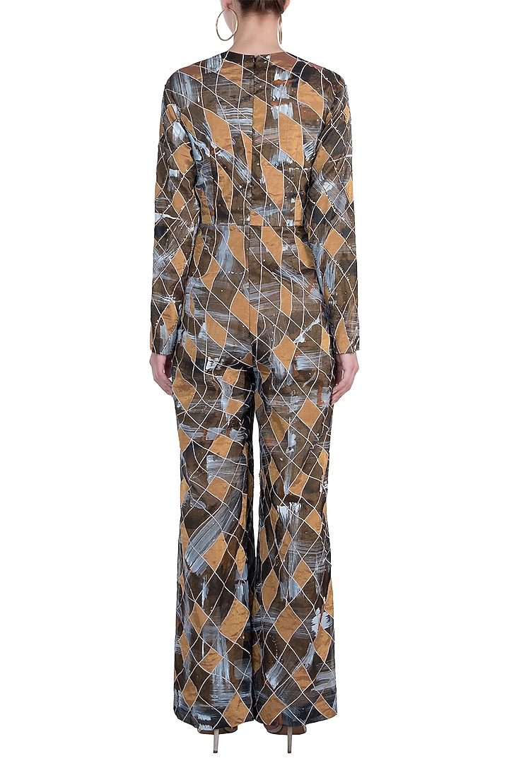 Black and gold jumpsuit available only at Pernia's Pop Up Shop.